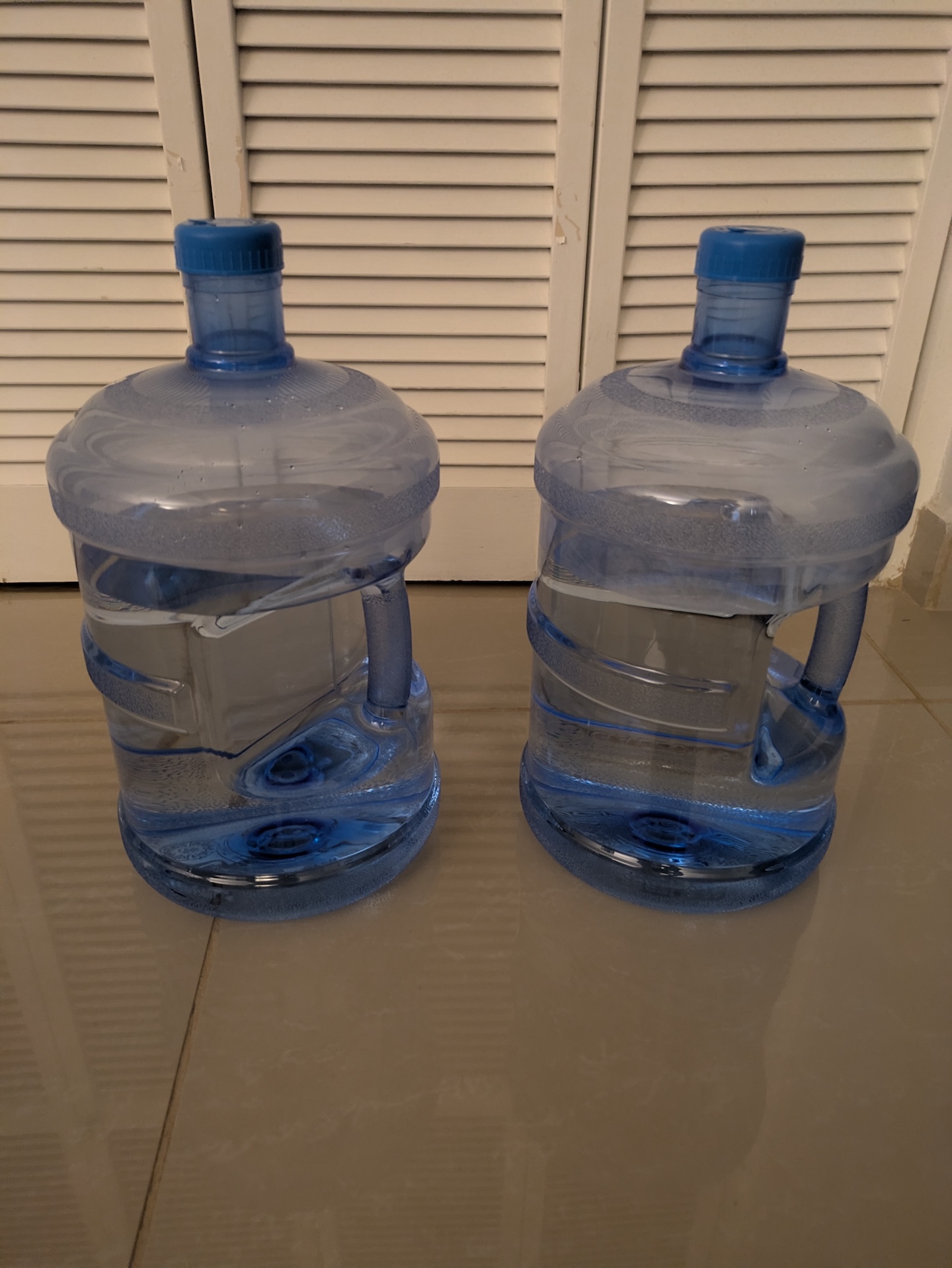 weights made from three gallon water jugs